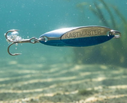 Acme Kastmaster winter pike spoon — chrome and blue pattern