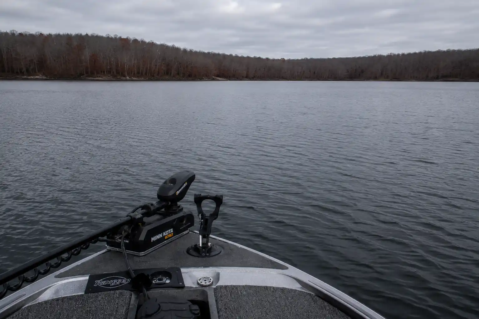 Boat positioned over deep open water during late fall pike fishing