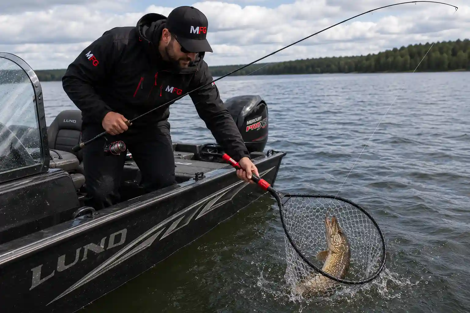 Best Pike Landing Nets showing a foldable landing net in use on a northern pike
