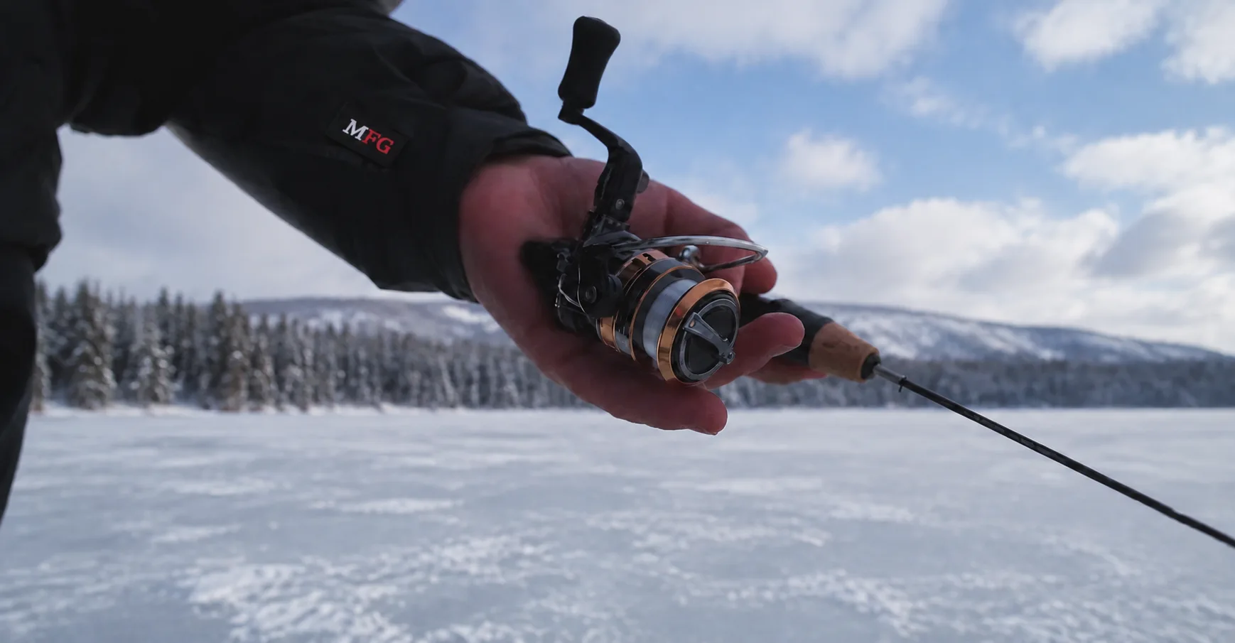 MFG angler showing an ice fishing rod and reel combo