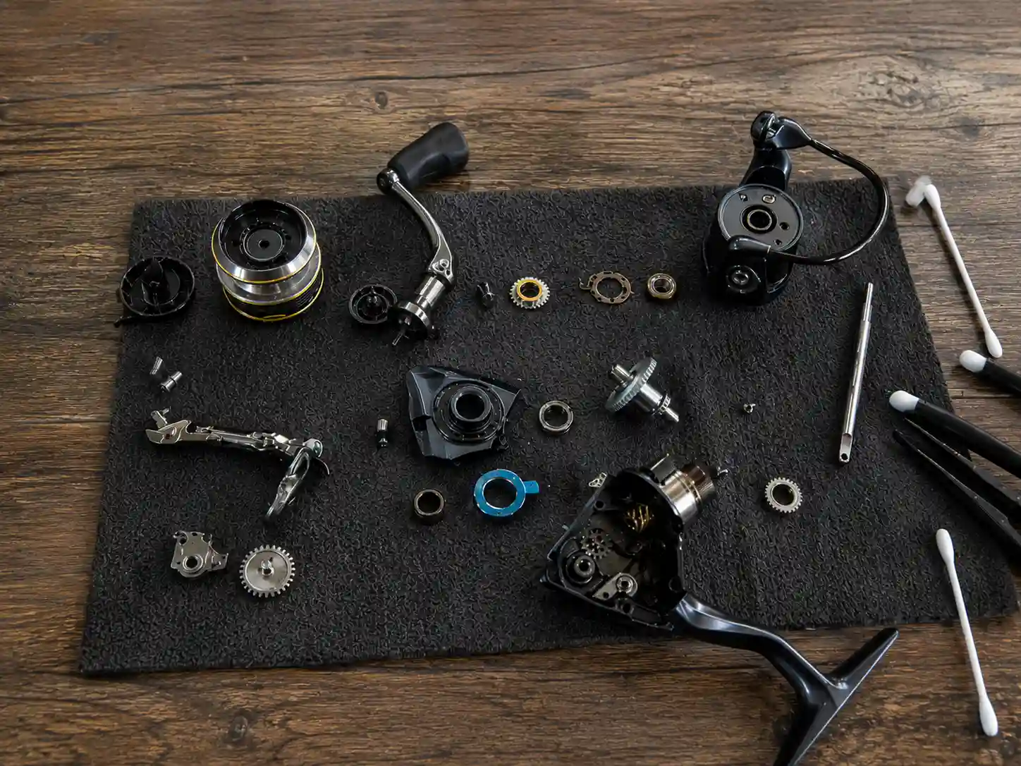 Pflueger President reel disassembled for winter maintenance and cleaning