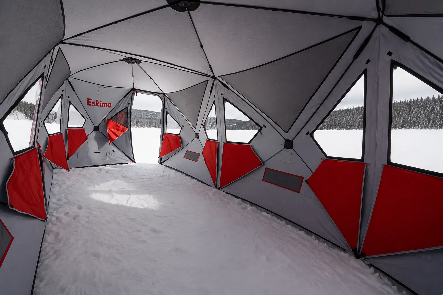 Interior view of the Eskimo Outbreak 850XDP ice fishing shelter with windows for watching a tip-up spread