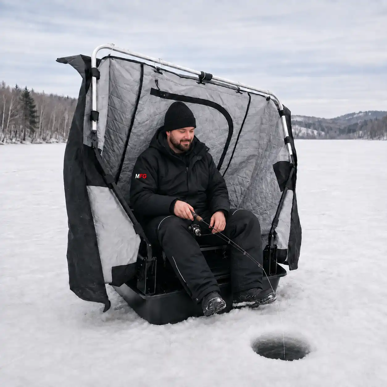 Flip-over ice fishing shelter with sled base and swivel seat set up on the ice