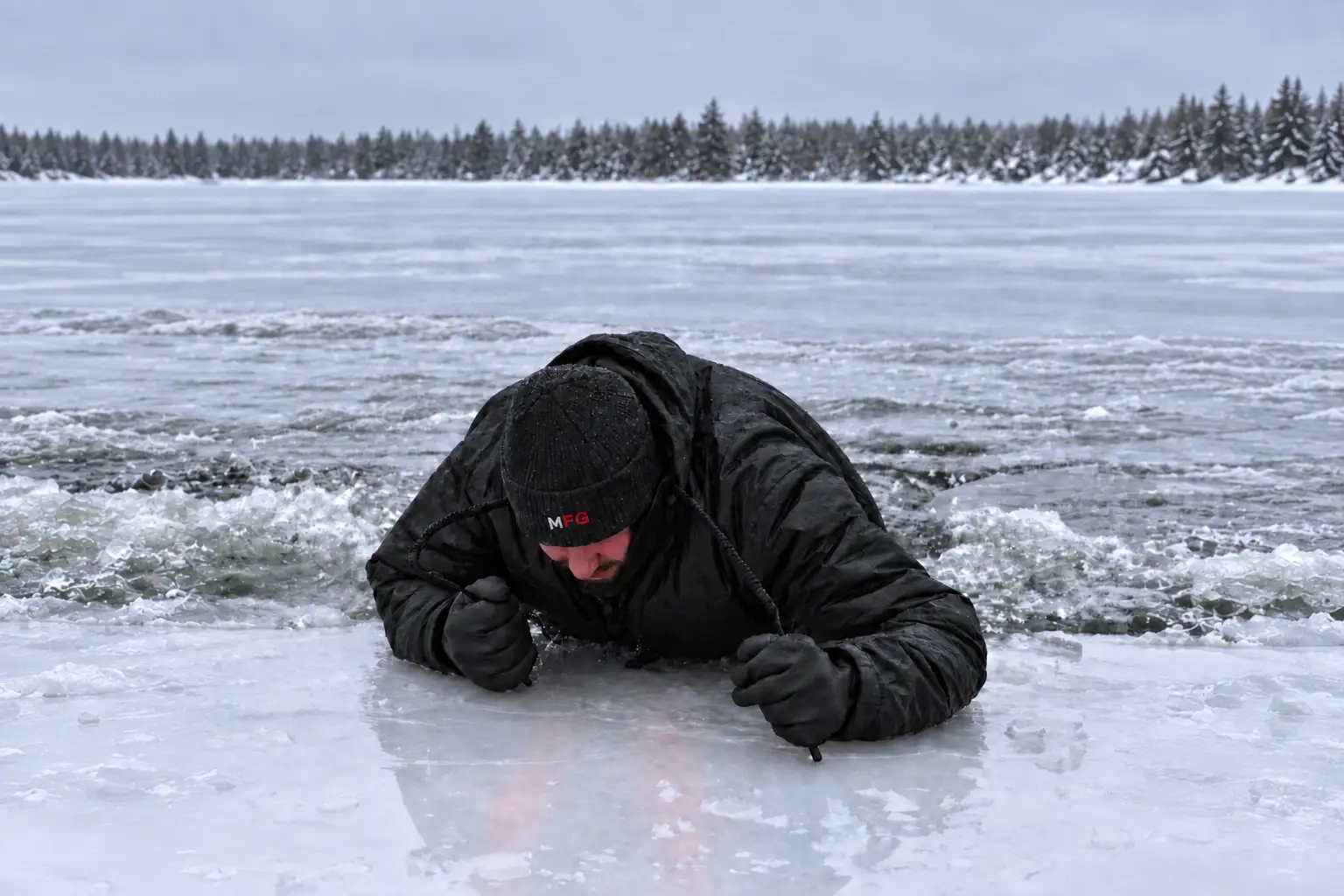 Ice fishing self-rescue technique using ice picks during a controlled cold-water drill
